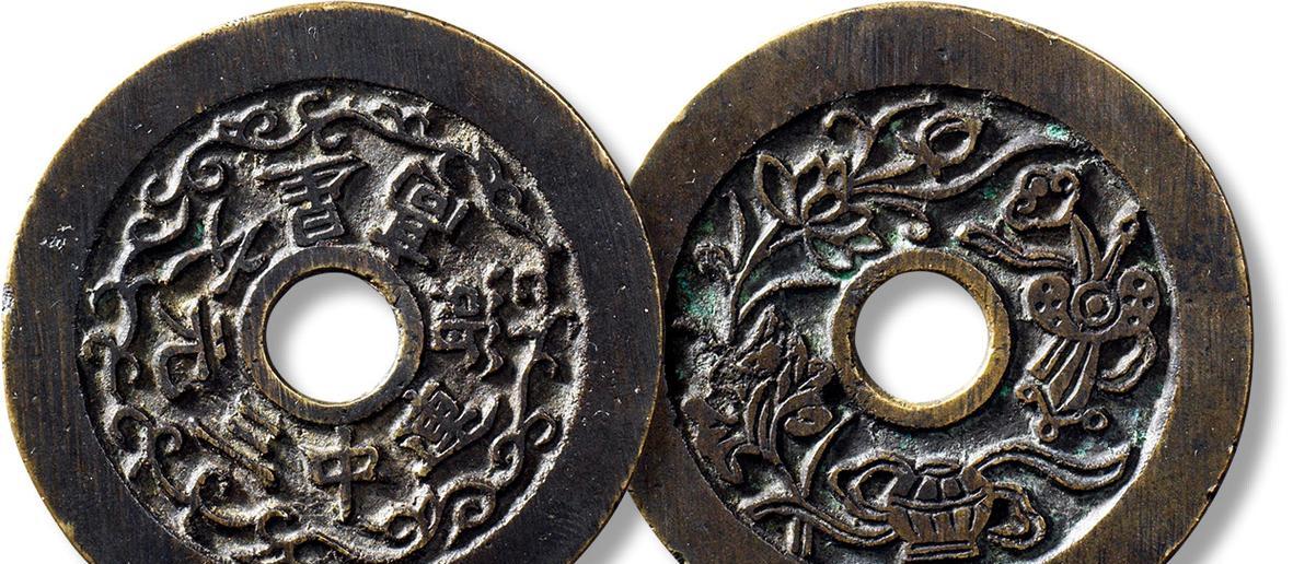 人民币上的花卉图象征着什么？花卉图的深层含义是什么？